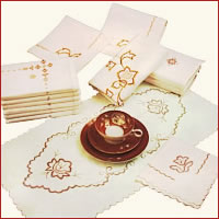 embroidered table-linen, embroidered goods